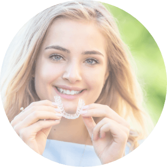 Woman placing a clear aligner