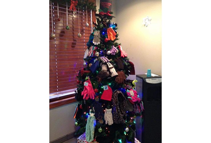 Tree filled with mittens for donation