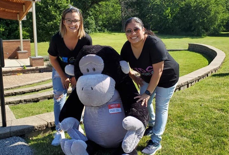 Two dental team members with Parker the Grayslake Park District mascot