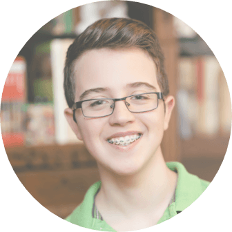 Teen boy with traditional braces