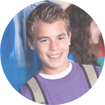 Teen boy with Vecter T A S accelerated braces