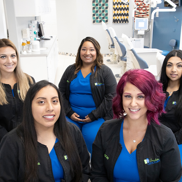 Orthodontic team members ready to help patients maximize dental insurance benefits