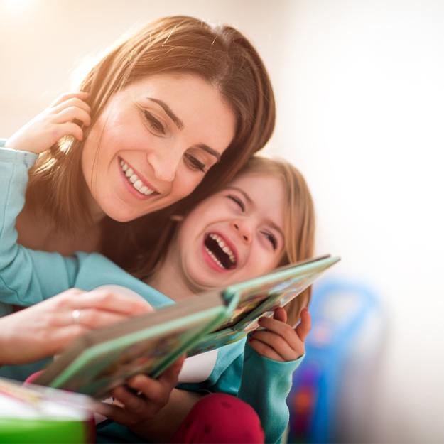 Smiling mother daughter after phase one orthodontics visit