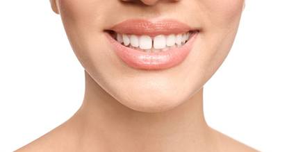 Person’s smile with gap between the front teeth
